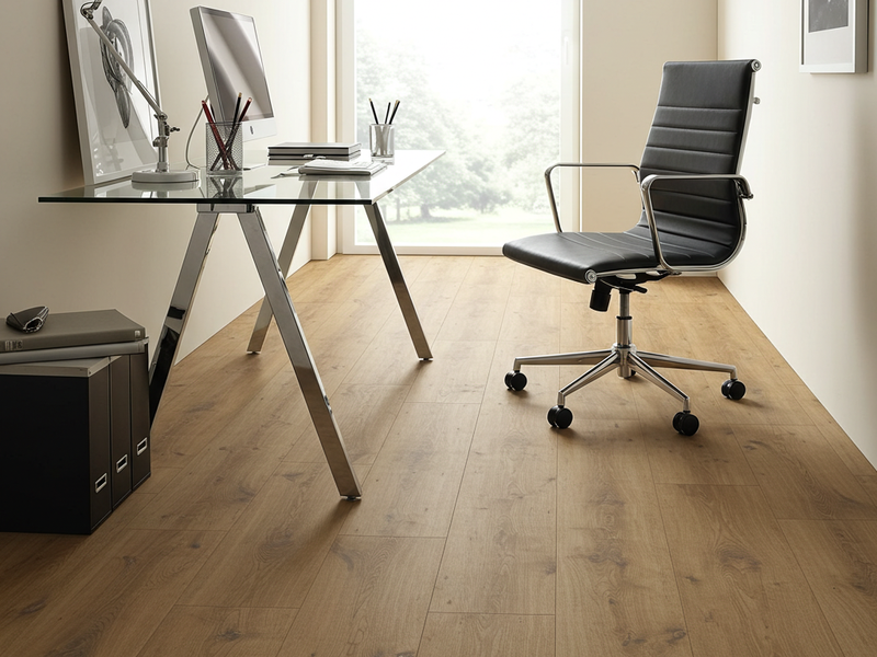 Modern home office with warm natural laminate flooring by Monarch Floors